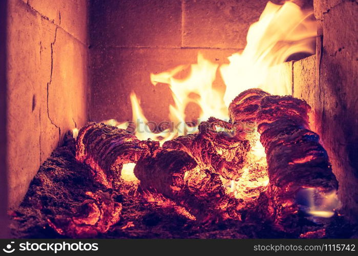 Blaze fire flame in stove, orange and black