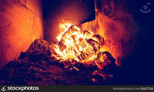 Blaze fire flame in stove, orange and black