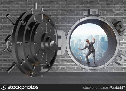 Blindfolded businessman in front ot vault door