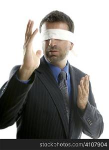 Blindfolded businessman over white background, defense martial arts