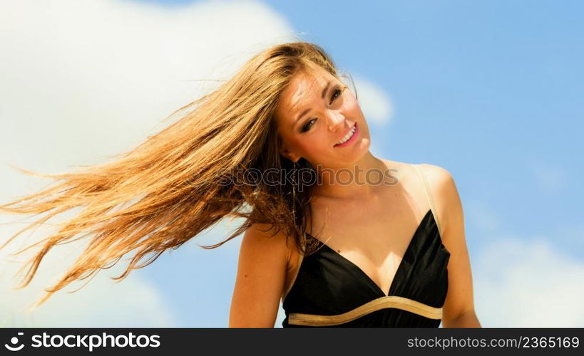 Blissful woman vacation day. Happy smiling crazy tourist on beach outdoor.