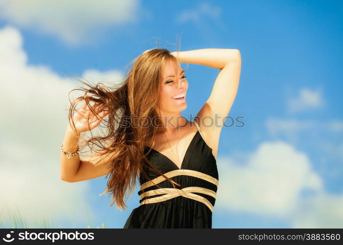 Blissful woman vacation day. Happy smiling tourist on beach outdoor.