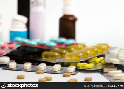 blister with medicine pills on a white background