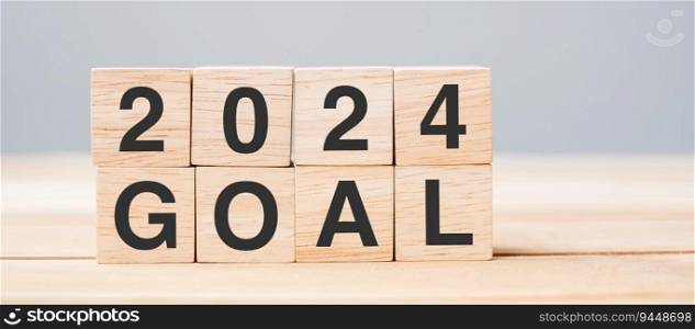 block 2024 GOAL text on table. Resolution, strategy, plan, motivation, reboot, business and New Year holiday concepts