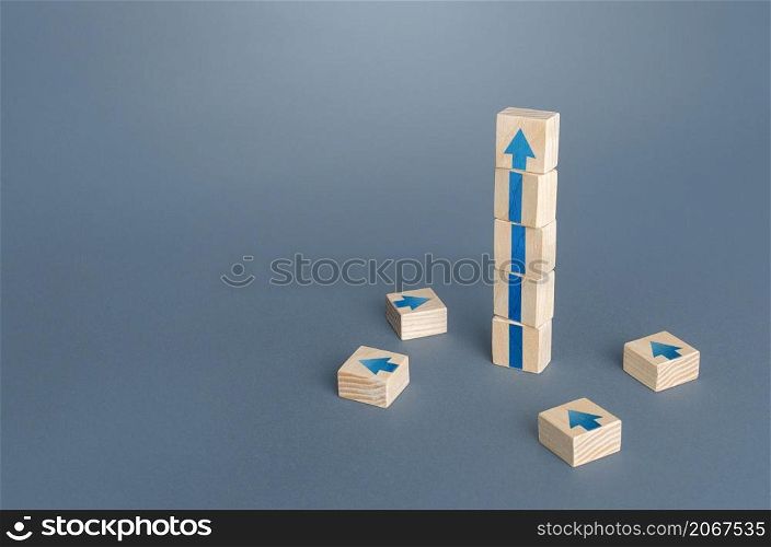 Block tower with arrows. Growth, development progress concept. Achieve success. Career promotion. Step by step. improving skills. Goal achievement. Progress and movement forward. Self improvement