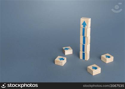 Block tower with arrows. Growth, development progress concept. Achieve success. Career promotion. Step by step. improving skills. Goal achievement. Progress and movement forward. Self improvement
