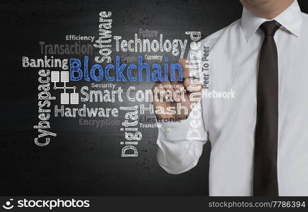 Blockchain Cloud is written by businessman on screen.. Blockchain Cloud is written by businessman on screen