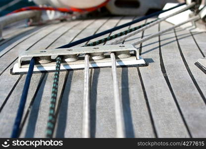 Blocks with rope on sailing boat in the sea