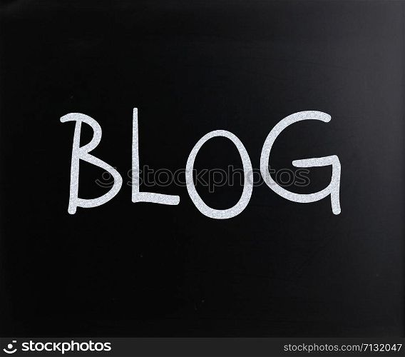 ""Blog" handwritten with white chalk on a blackboard"