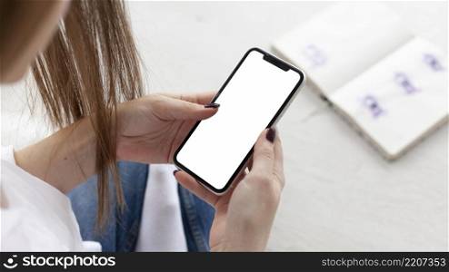 blogger checking blank phone