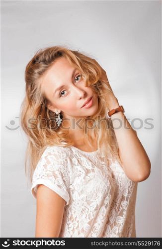 blond 20s female studio shot, head and shoulders image