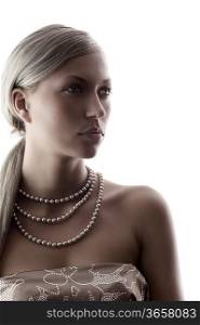blond and pretty elegant and attractive woman with pearl necklace