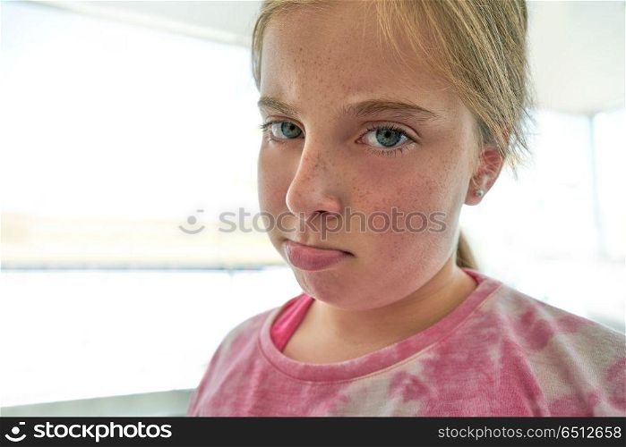 Blond angry lips kid girl expression . Angry lips kid girl expression blue eyes blond