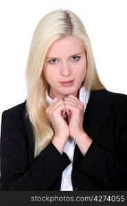 Blond business woman awaiting result of interview