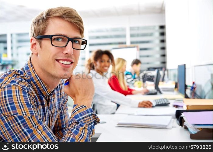 Blond businessman young in office with computer in a desk row