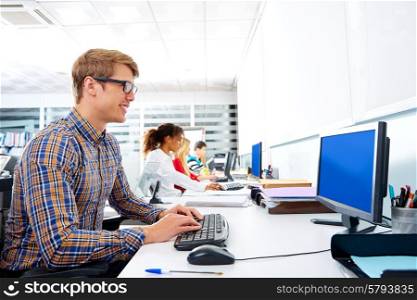 Blond businessman young in office with computer in a desk row