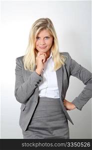 Blond businesswoman doing expressions on white background