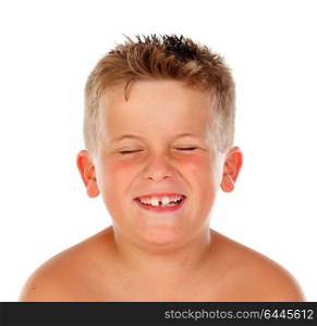 Blond child with a funny expression closing his eyes isolated on a white background