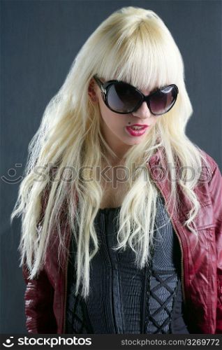 blond fashion girl portrait red lips gray background