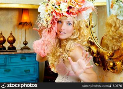 blond fashion woman with spring flowers hat funny expression
