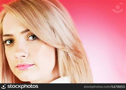 Blond girl against colourful background