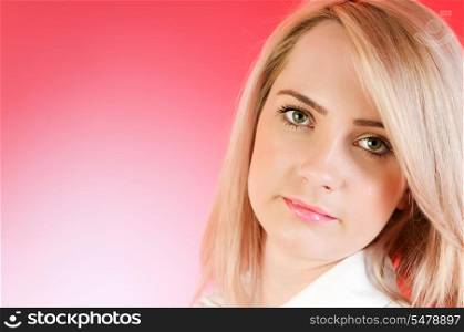 Blond girl against colourful background
