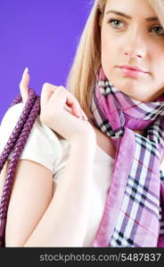 Blond girl against colourful background