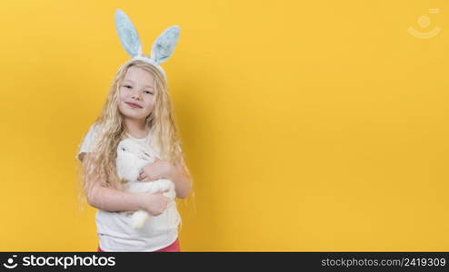 blond girl bunny ears with rabbit