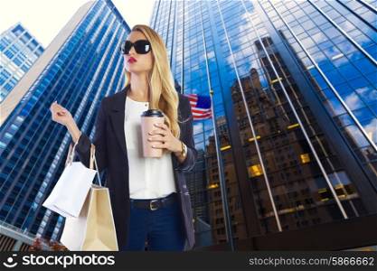 Blond girl shopaholic in Manhattan New York Americas Avenue Photomount