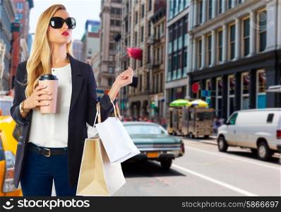 Blond girl shopaholic in Manhattan Soho New York shopping with coffee Photomount