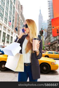 Blond girl shopaholic talking phone in fifth 5th avenue on New York Manhattan Photomount