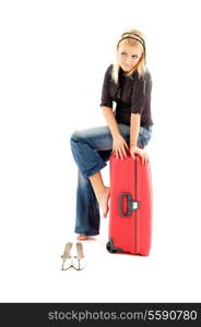 blond girl sitting on red trunk over white