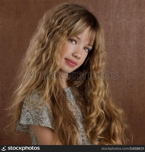 Blond kid girl curly hair portrait on retro vintage brown background