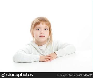 blond kid girl portrait on white desk table isolated studio background