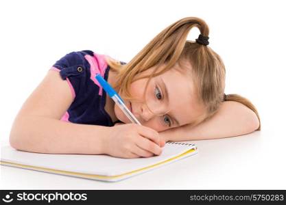 Blond kid indented girl student with spiral notebook in pupil desk