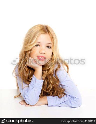 blond kid little student girl portrait smiling on a desk in white background