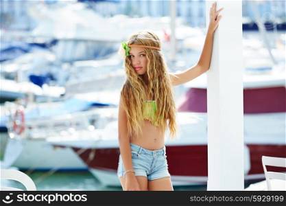 Blond kid teen girl in Mediterranean port of Spain