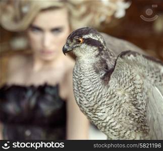 Blond lady with the wild falcon