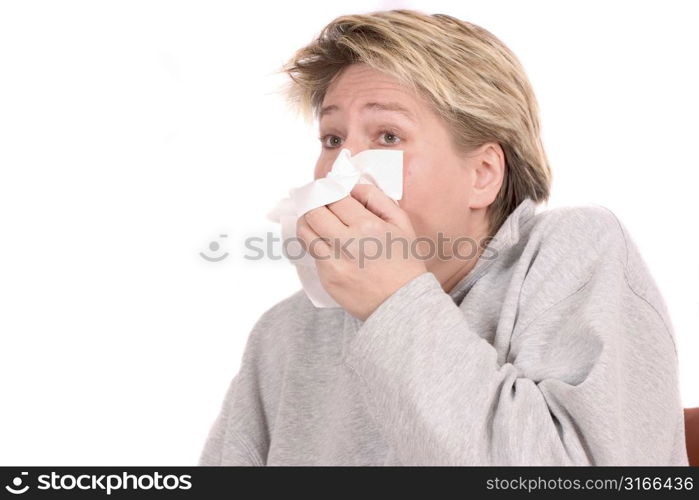 Blond mature woman needing to sneeze