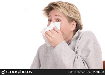 Blond mature woman needing to sneeze