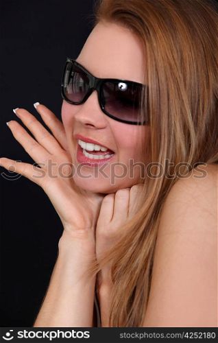 Blond model wearing sunglasses