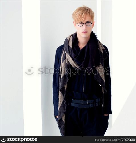 blond modern handsome student man with nerd glasses portrait