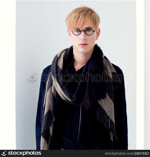 blond modern handsome student man with nerd glasses portrait