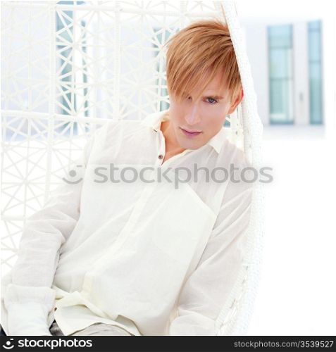 blond modern man portrait in summer terrace vampire inspiration