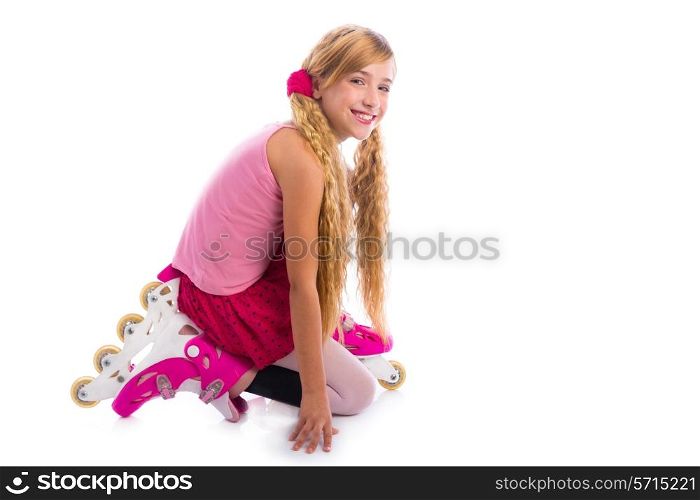 blond pigtails roller skate girl on her knees happy on white background
