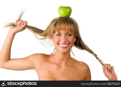 blond pretty woman with a green apple on her head and playing with hair