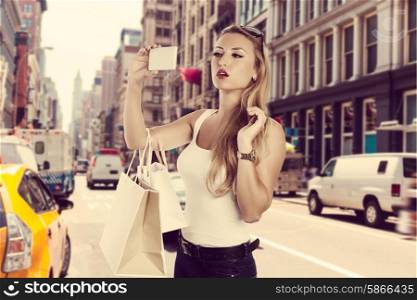 Blond shopaholic tourist girl selfie photo in Soho New York Photomount
