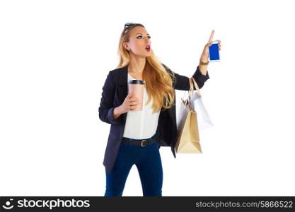 Blond shopaholic woman with bags coffee and smartphone stopping taxi finger