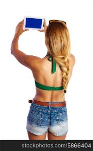 blond short jeans sexy tourist woman selfie photo with tablet PC on white background rear view