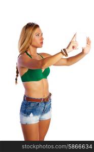 blond short jeans sexy tourist woman selfie photo with tablet PC on white background
